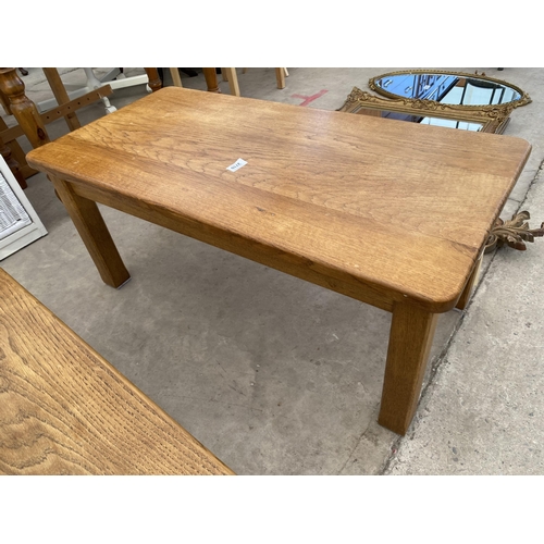 2710 - A MODERN OAK COFFEE TABLE ON SQUARE LEGS, 36X17.5