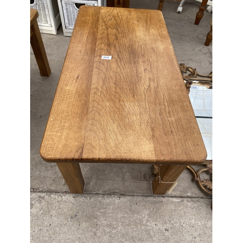 2710 - A MODERN OAK COFFEE TABLE ON SQUARE LEGS, 36X17.5