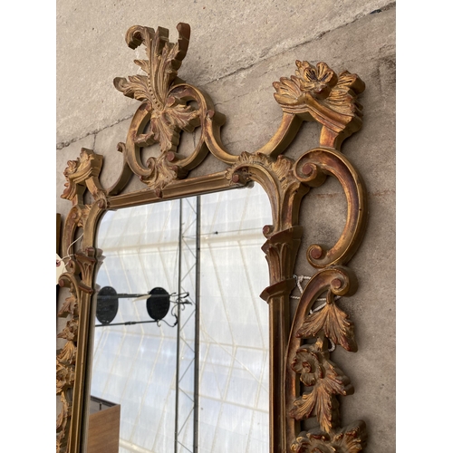 2711 - A 19TH CENTURY STYLE GILT EFFECT WALL MIRROR, 41X23