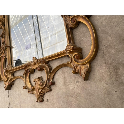 2711 - A 19TH CENTURY STYLE GILT EFFECT WALL MIRROR, 41X23