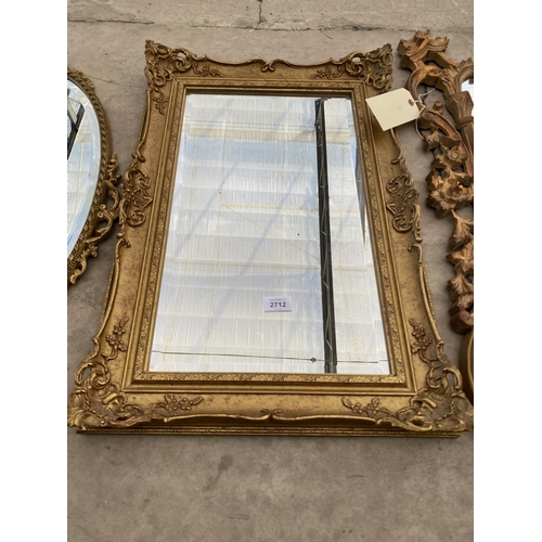 2712 - A MODERN GILT EFFECT WALL MIRROR, 26X18