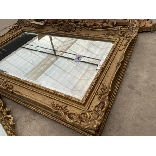 2712 - A MODERN GILT EFFECT WALL MIRROR, 26X18