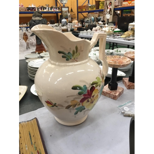 179A - A LARGE FLORAL DECORATED WASH JUG