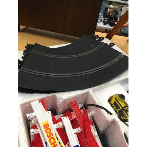 720 - A VINTAGE BOXED SCALEXTRIC 300 WITH MINI CARS - CANNOT GUARANTEE COMPLETE