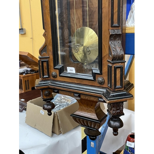 266 - AN ORNATE DOUBLE WEIGHT VIENNA WALL CLOCK IN A MAHOGANY CASE