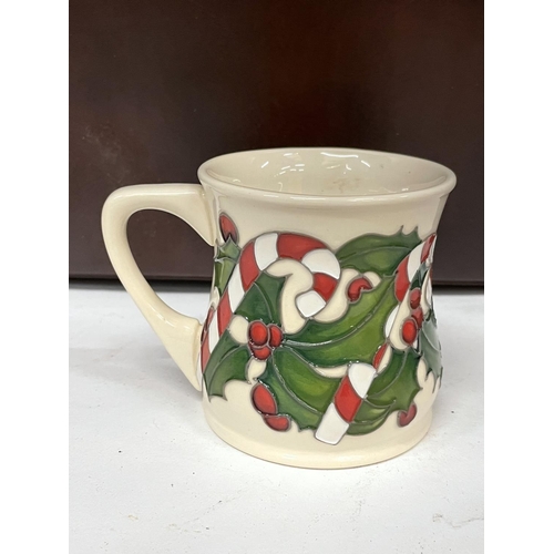 420A - A MOORCROFT CHRISTMAS CANDY CANE MUG RRP £195.00