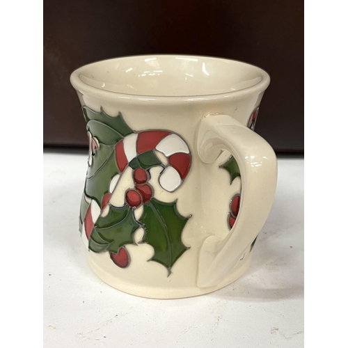 420A - A MOORCROFT CHRISTMAS CANDY CANE MUG RRP £195.00