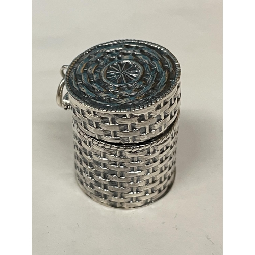 640 - A MARKED SILVER THIMBLE CASE IN THE GUISE OF A BASKET