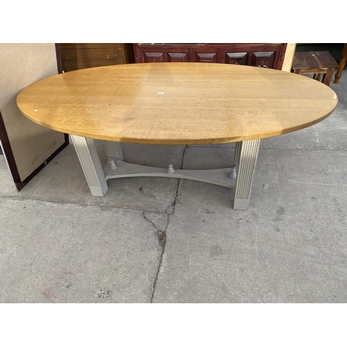 2717 - AN OVAL OAK DINING TABLE, 79X43