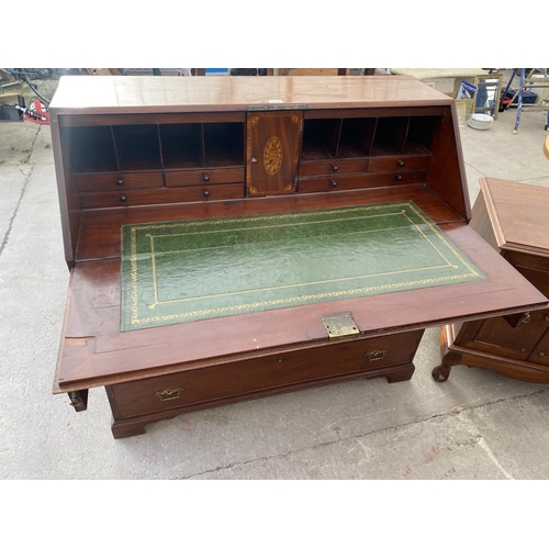 2719 - A 19TH CENTURY MAHOGANY INLAID AND CROSSBANDED BUREAU WITH FITTED INTERIOR AND FOUR GRADUATED DRAWER... 