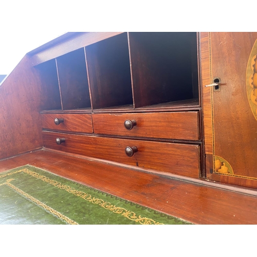 2719 - A 19TH CENTURY MAHOGANY INLAID AND CROSSBANDED BUREAU WITH FITTED INTERIOR AND FOUR GRADUATED DRAWER... 