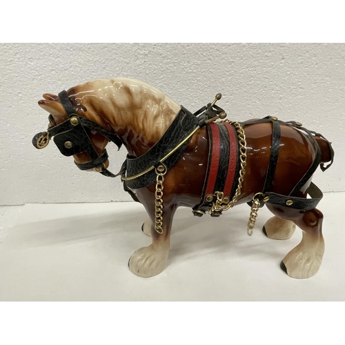 496 - TWO SHIRE HORSES WITH HARNESS