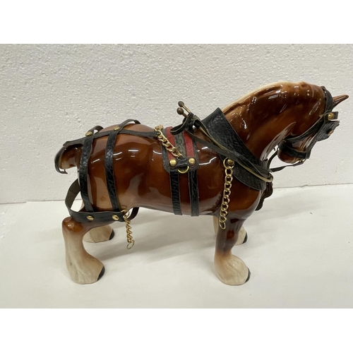 496 - TWO SHIRE HORSES WITH HARNESS