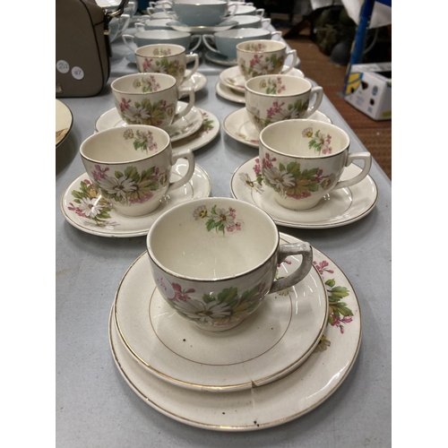 143 - A QUANTITY KIRKLANDS EMBASSY WARE TO INCLUDE FLORAL PATTERN CUPS, SAUCERS AND SIDE PLATES