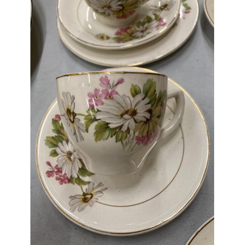 143 - A QUANTITY KIRKLANDS EMBASSY WARE TO INCLUDE FLORAL PATTERN CUPS, SAUCERS AND SIDE PLATES