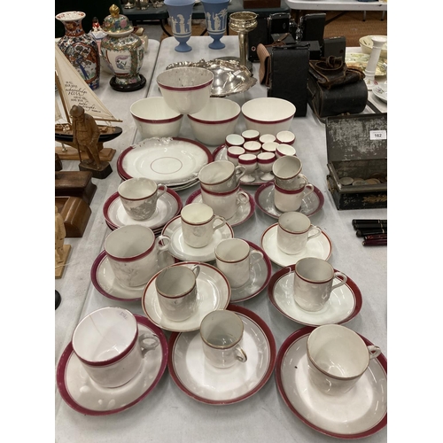 163 - A LARGE QUANTITY OF RED AND WHITE CHINA CUPS, SAUCERS, PLATES, EGG CUPS, BOWLS, ETC TO INCLUDE PLANT... 