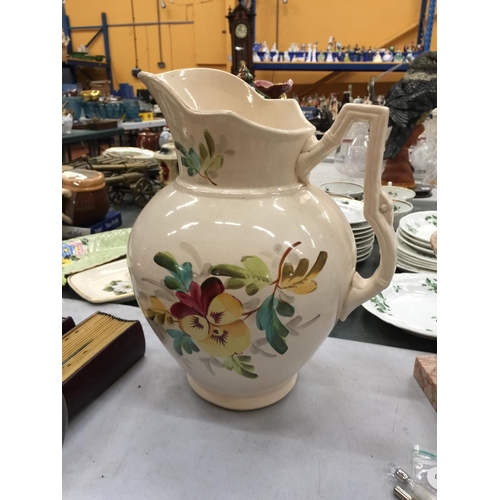 179A - A LARGE FLORAL DECORATED WASH JUG