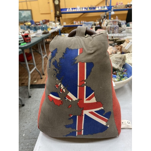 182 - TWO HEAVY CLOTH DOORSTOPS - A SCOTTY DOG AND THE UNITED KINGDOM