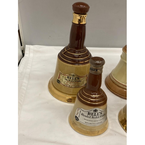 231 - FOUR VINTAGE CERAMIC BELL'S WHISKY BELL SHAPED DECANTERS