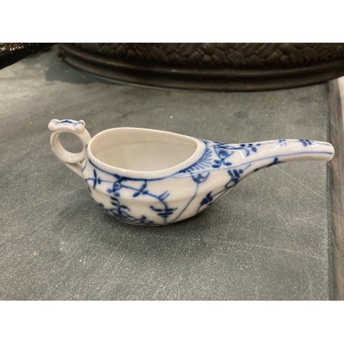 244 - AN ORIENTAL BLUE AND WHITE DRINKING VESSEL