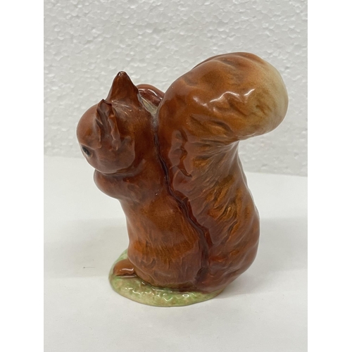 330 - A BESWICK BEATRIX POTTER FIGURE SQUIRREL NUTKIN WITH GOLD BACK STAMP