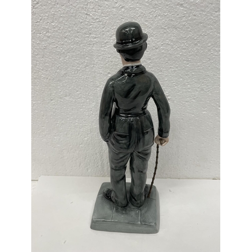 341 - A ROYAL DOULTON FIGURE CHARLIE CHAPLIN HN 2771