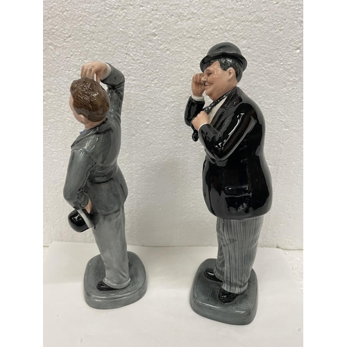 342 - TWO ROYAL DOULTON FIGURES STAN LAUREL HN 2774 AND OLIVER HARDY HN 2775