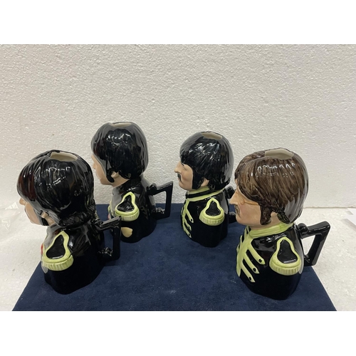 373 - A SET OF FOUR LIMITED EDITION LEGENDS OF ROCK AND ROLL BAIRSTOW MANOR COLLECTABLES BEATLE TOBY JUGS