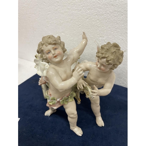 417 - A CONTINENTAL CHERUB PLANT POT HOLDER