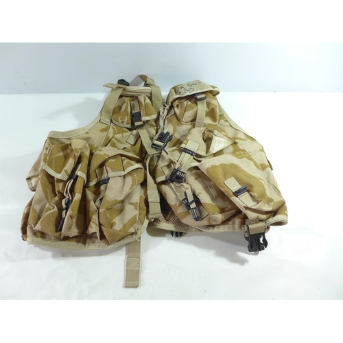 346 - A MILITARY DESERT CAMOUFLAGED WAISTCOAT WITH NUMEROUS POUCHES