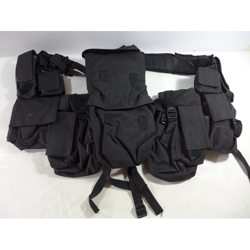 348 - A BLACK TACTICAL LOAD BEARING VEST, WITH NUMEROUS POUCHES