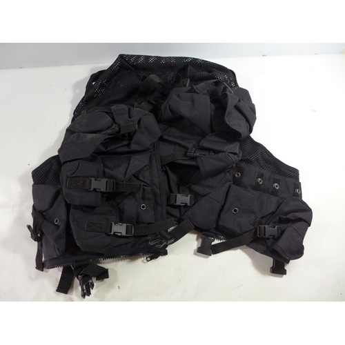 349 - A BLACK TACTICAL LOAD BEARING VEST, WITH NUMEROUS POUCHES