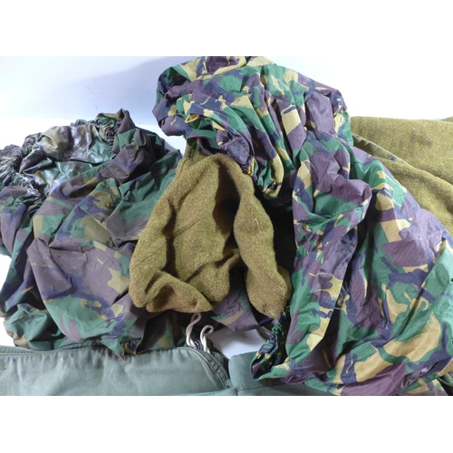 354 - A WOOLEN THERMAL SLEEPING BAG, ASSORTED CAMOUFLAGE CLOTHING, WEBBING, GUN SLIPCASE ETC