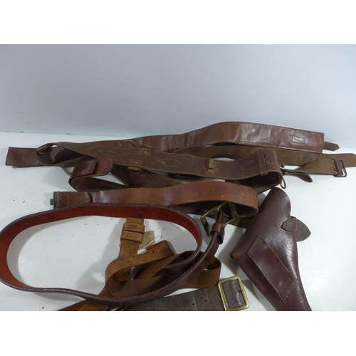 362 - A BRITISH LEATHER HOLSTER, SAM BROWNE BELT, FURTHER BELTS ETC