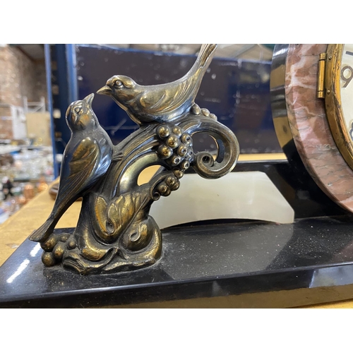 14 - AN ART DECO MARBLE MANTLE CLOCK WITH BRASS BIRD DESIGN