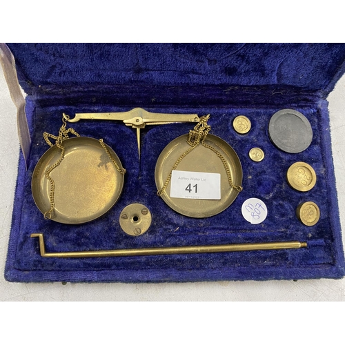 41 - A VINTAGE SET OF BRASS GOLD SCALES IN BLUE CASE