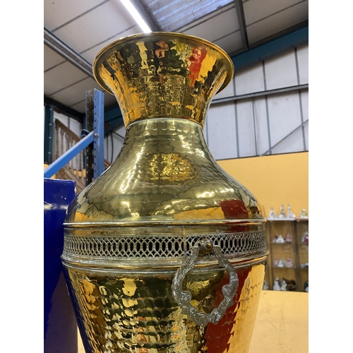 48 - A LARGE DECORATIVE VINTAGE BRASS MIDDLE EASTERN TWIN HANDLED FLOOR VASE, 54CM HEIGHT