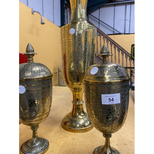 54 - A GROUP OF THREE MIDDLE EASTERN BRASS VASES