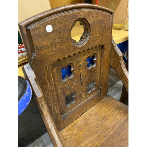 58 - A PAIR OF ECCLESIASTICAL ARTS & CRAFTS OAK ARMCHAIRS