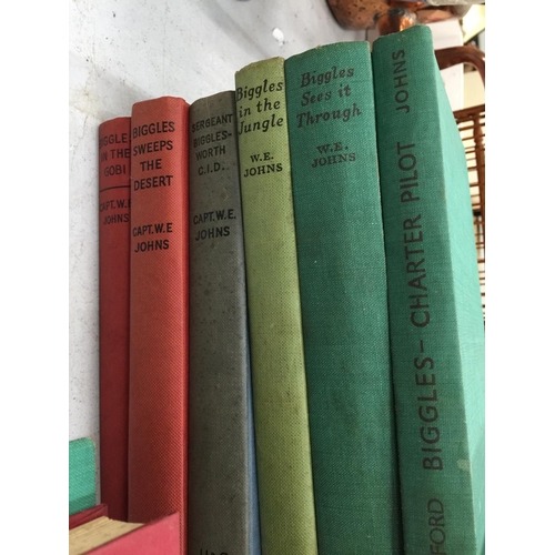 121 - A COLLECTION OF VINTAGE HARDBACK 'BIGGLES' BOOKS WRITTEN BY CAPT. W. E. JOHNS - 16 IN TOTAL