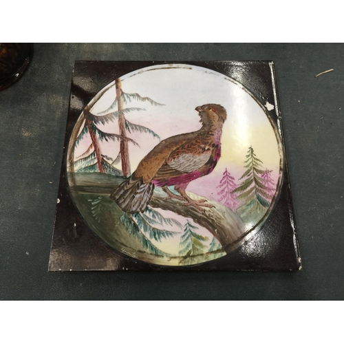 132 - A VINTAGE CERAMIC TILE WITH AN IMAGE OF A PHEASANT