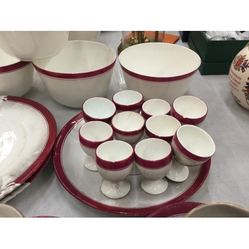 168 - A LARGE QUANTITY OF RED AND WHITE CHINA CUPS, SAUCERS, PLATES, EGG CUPS, BOWLS, ETC TO INCLUDE PLANT... 