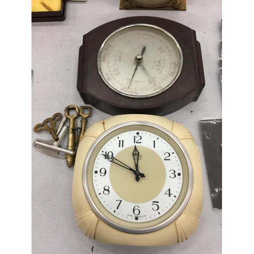 179 - A VINTAGE SMITH'S KITCHEN CLOCK AND A BAKELITE BAROMETER