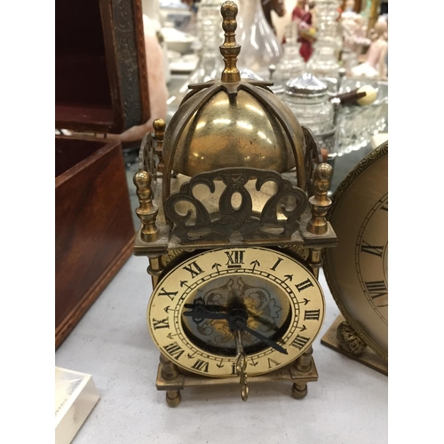 180 - THREE VINTAGE CLOCKS TO INCLUDE A BRASS LANTERN CLOCK, A PETIT POINT MANTLE CLOCK AND ALARM CLOCK