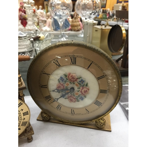 180 - THREE VINTAGE CLOCKS TO INCLUDE A BRASS LANTERN CLOCK, A PETIT POINT MANTLE CLOCK AND ALARM CLOCK