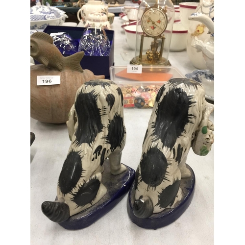 192 - A PAIR OF STAFFORDSHIRE STYLE DOGS CARRYING BASKETS HEIGHT 15CM