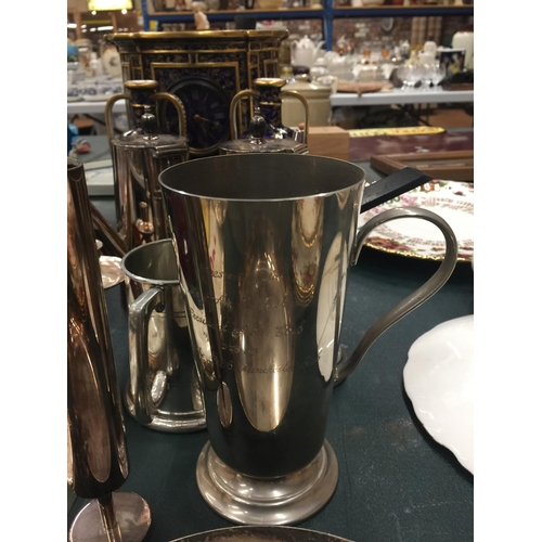 65 - A QUANTITY OF SILVER PLATE ITEMS TO INCLUDE TANKARDS, COFFEE POTS, DISH WITH SQUIRREL DESIGN ETC