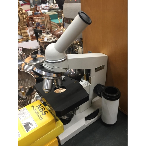 79 - A LOMO MICMED MICROSCOPE IN A WOODEN CASE WITH KEY, SLIDES, INSTRUCTIONS, ADAPTOR RING ETC