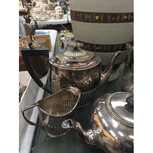 80 - A QUANTITY OF SILVER PLATED ITEMS TO INCLUDE TEA AND COFFEE POTS, JUG, SUGAR, CONDIMENTS, TRAYS ETC