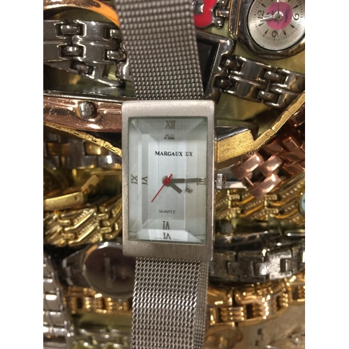 83 - A LARGE QUANTITY OF VARIOUS FASHION WATCHES TO INCLUDE